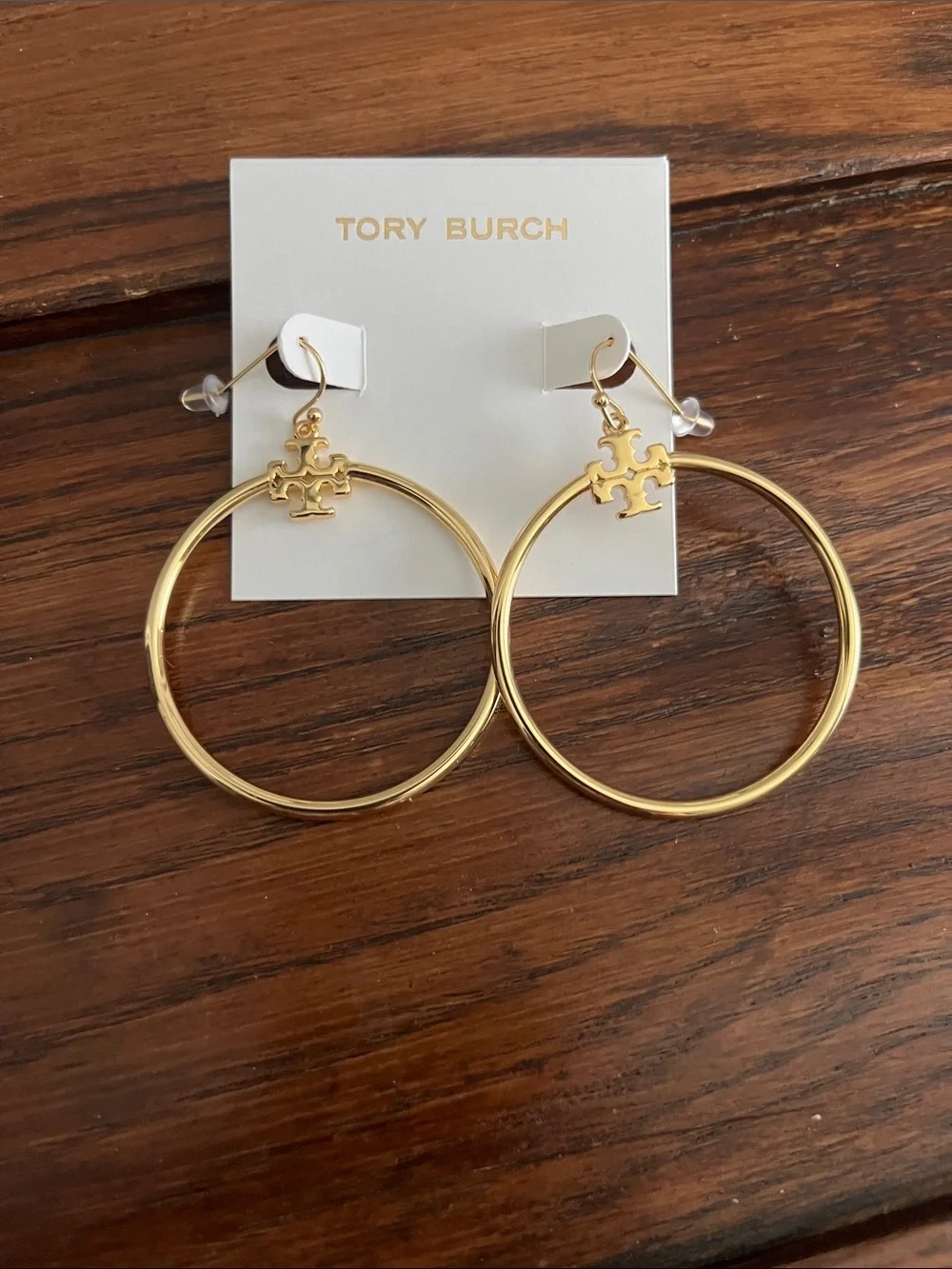 Tory Burch Polished Gold Tone Hoop Earrings with Logo Charm